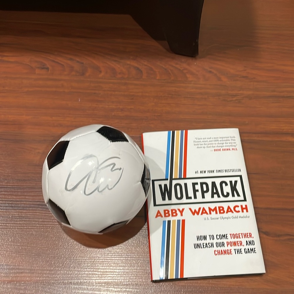Abby wambach Wolfpack hardcover book and soccer ball- both signed autographed